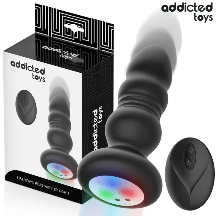 ADDICTED JUGUETES - PLUG ANAL VIBRADOR THRUSTING Y LUZ LED CONTROL REMOTO